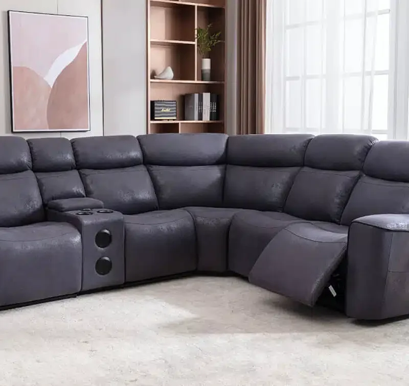 Elysian Luxe grey corner recliner sofa with three power recliners, luxury leather-look fabric, cooling cup holders, wireless charging, and built-in speakers.